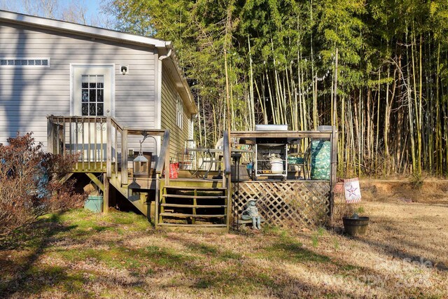 exterior space featuring a wooden deck