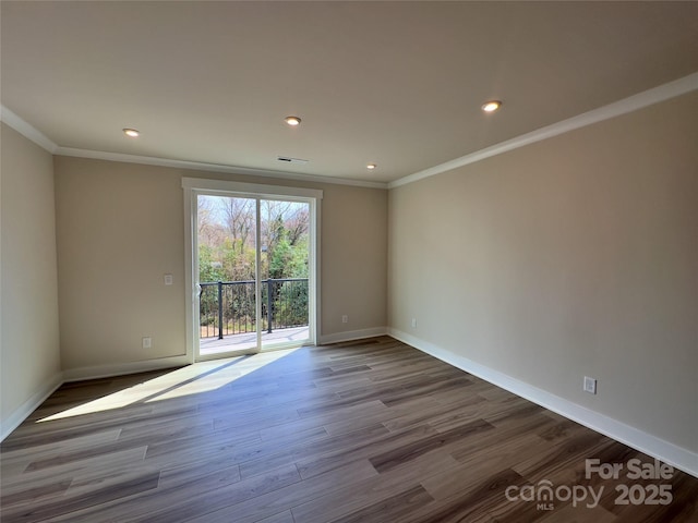 unfurnished room with recessed lighting, wood finished floors, baseboards, and ornamental molding