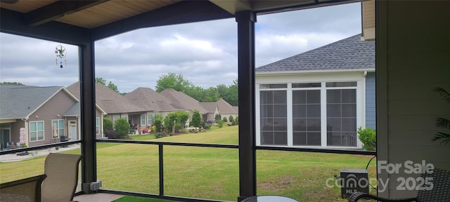 17436 Langston Dr, Charlotte, NC 28278 - unfurnished sunroom featuring beam ceiling and a residential view