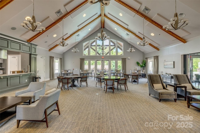 17436 Langston Dr, Charlotte, NC 28278 - living room featuring a chandelier, high vaulted ceiling, light colored carpet, recessed lighting, and beamed ceiling