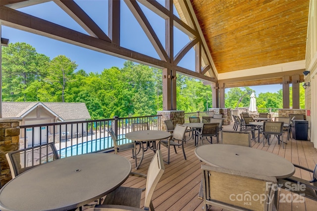 17436 Langston Dr, Charlotte, NC 28278 - deck with outdoor dining area and view of scattered trees