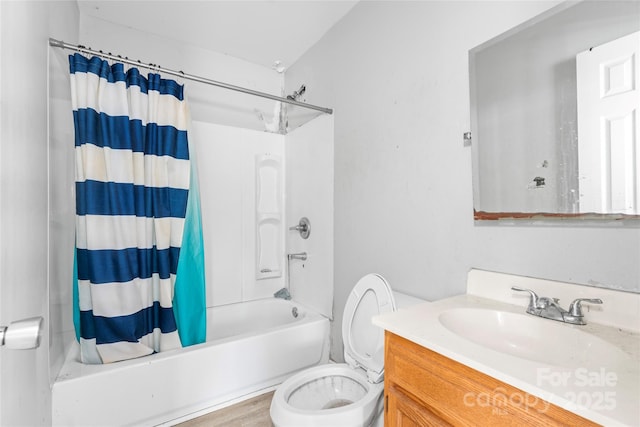 full bathroom with toilet, shower / bath combo with shower curtain, vanity, and wood finished floors