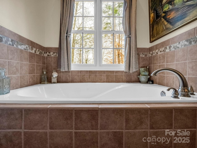 full bath with tile walls and a bath