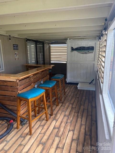 wooden deck featuring outdoor dry bar