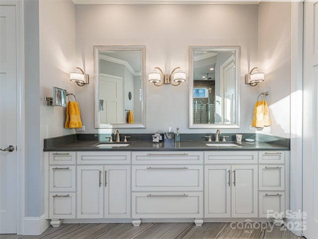 bathroom with double vanity and a sink