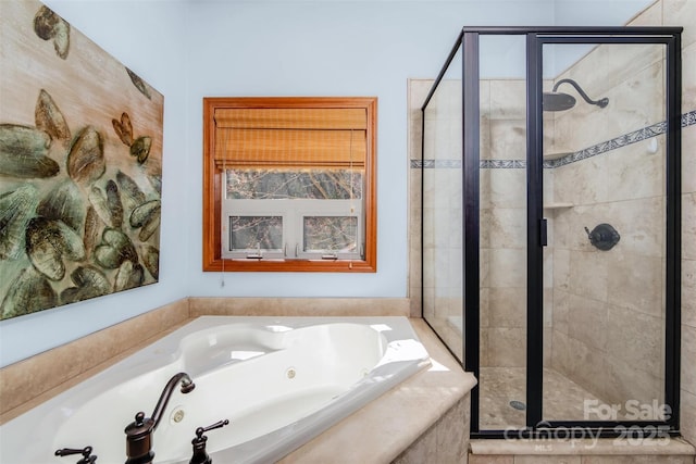 full bath featuring a shower stall and a whirlpool tub