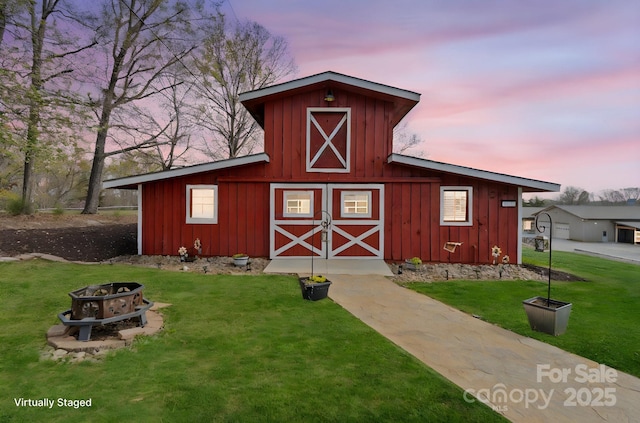 1620 London Rd, Mooresville, NC 28115 - view of barn featuring an outdoor fire pit and a lawn