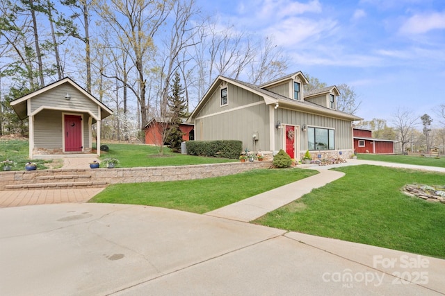 1620 London Rd, Mooresville, NC 28115 - view of front facade featuring a front lawn and board and batten siding