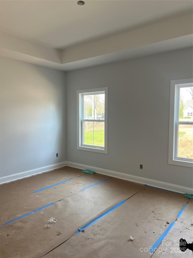 empty room with baseboards