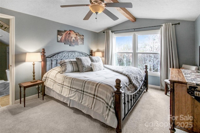 bedroom with light carpet, a textured ceiling, baseboards, ceiling fan, and vaulted ceiling with beams