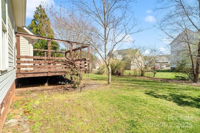 view of yard featuring a deck