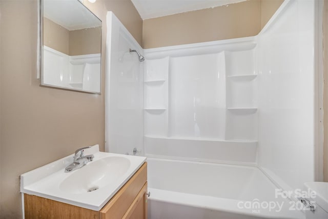 bathroom with washtub / shower combination and vanity