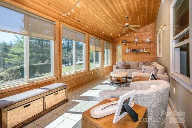 sunroom with vaulted ceiling, wooden ceiling, and ceiling fan