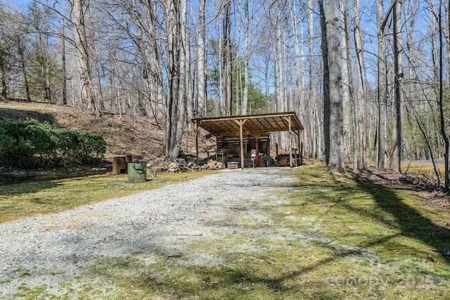 view of pole building with a yard