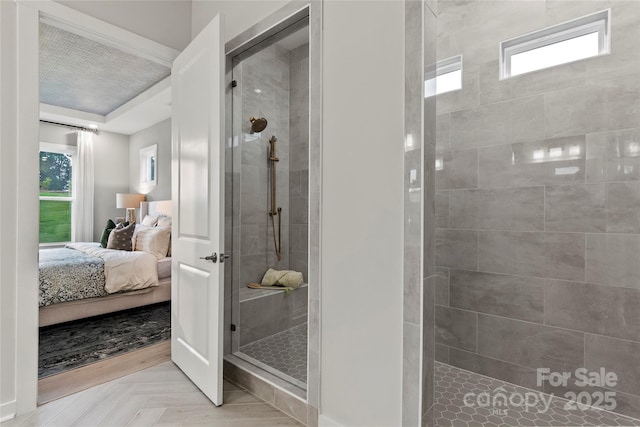 full bathroom featuring a shower stall and connected bathroom