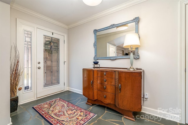 foyer entrance featuring baseboards and ornamental molding