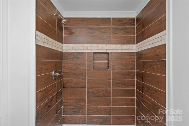 bathroom featuring tiled shower