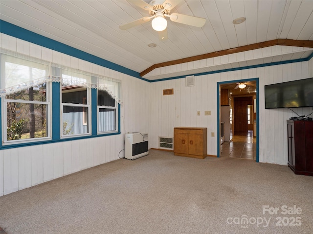 140 Hangin Dog Ln, Lake Toxaway, NC 28747 - carpeted empty room with visible vents, a ceiling fan, heating unit, and vaulted ceiling