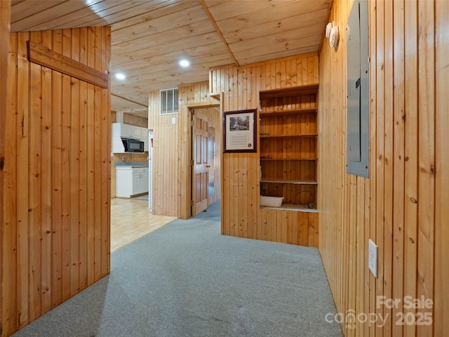 140 Hangin Dog Ln, Lake Toxaway, NC 28747 - carpeted spare room featuring electric panel, recessed lighting, wooden walls, visible vents, and wooden ceiling