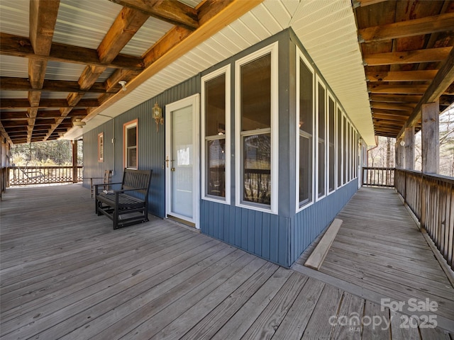 140 Hangin Dog Ln, Lake Toxaway, NC 28747 - wooden deck with covered porch