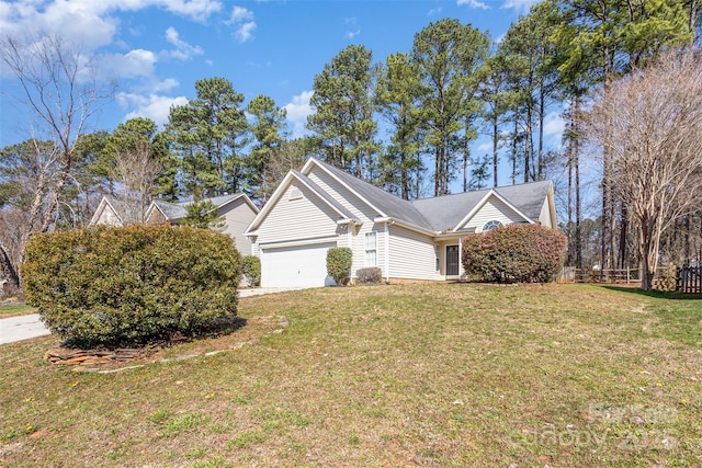 view of property exterior with a garage and a yard