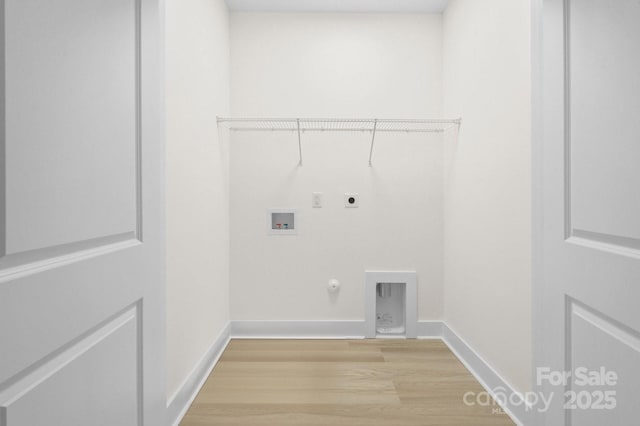 10405 Briarhurst Pl Unit 18, Mint Hill, NC 28227 - laundry room with electric dryer hookup, light wood-style floors, washer hookup, hookup for a gas dryer, and baseboards