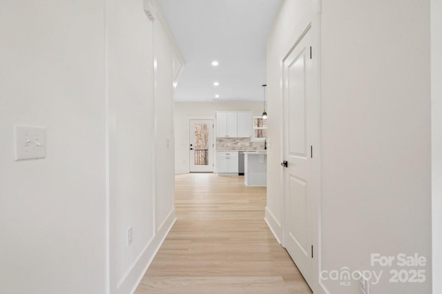 10405 Briarhurst Pl Unit 18, Mint Hill, NC 28227 - hallway with light wood finished floors, recessed lighting, and baseboards