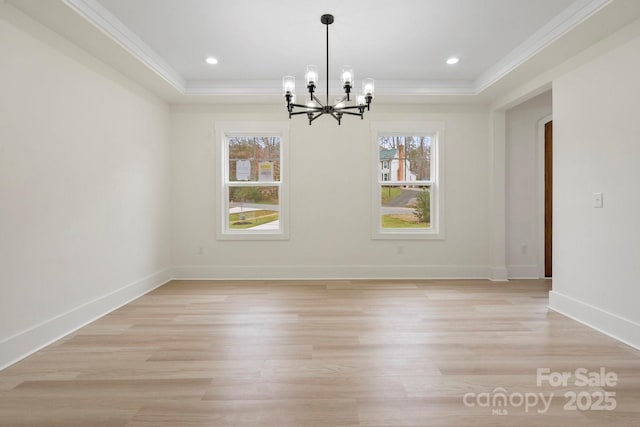 10405 Briarhurst Pl Unit 18, Mint Hill, NC 28227 - unfurnished dining area with a raised ceiling, ornamental molding, a chandelier, light wood-style floors, and baseboards