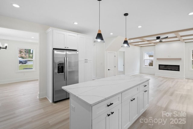 10405 Briarhurst Pl Unit 18, Mint Hill, NC 28227 - kitchen featuring stainless steel fridge, light wood-style flooring, recessed lighting, light stone counters, and white cabinetry