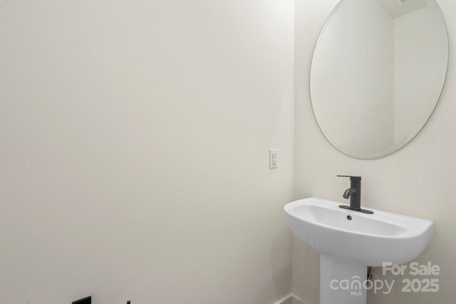 10405 Briarhurst Pl Unit 18, Mint Hill, NC 28227 - bathroom featuring baseboards