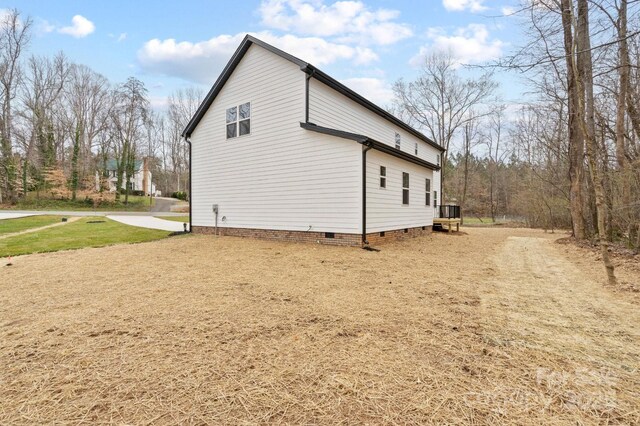 10405 Briarhurst Pl Unit 18, Mint Hill, NC 28227 - view of side of property featuring crawl space and a lawn