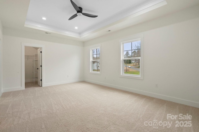 10405 Briarhurst Pl Unit 18, Mint Hill, NC 28227 - empty room featuring a raised ceiling, baseboards, light colored carpet, and recessed lighting