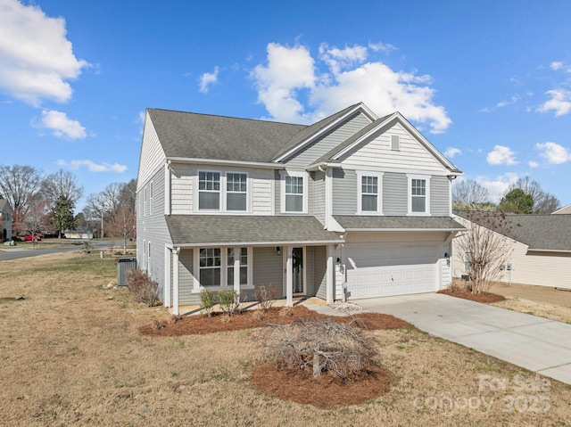 traditional-style house featuring a porch, an attached garage, central AC, a shingled roof, and concrete driveway