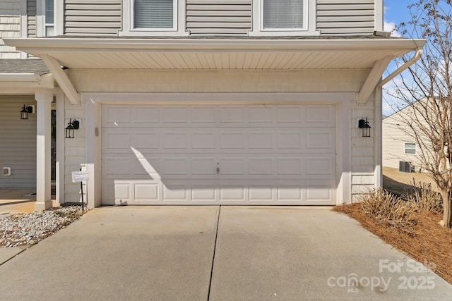 garage featuring driveway