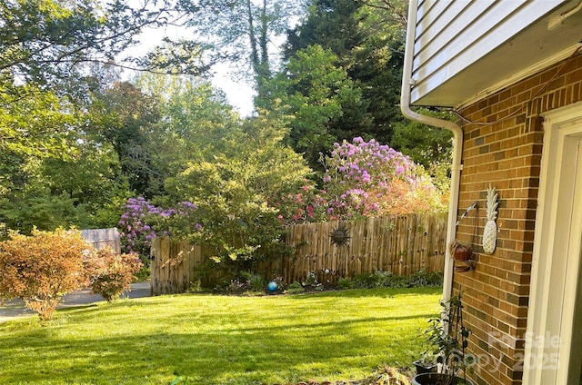 view of yard featuring fence