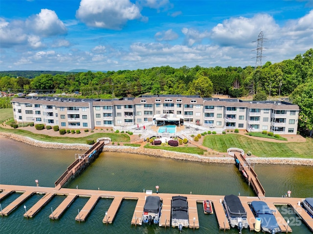 birds eye view of property featuring a water view