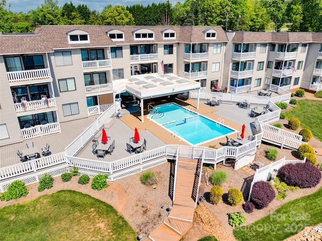pool featuring a fenced backyard