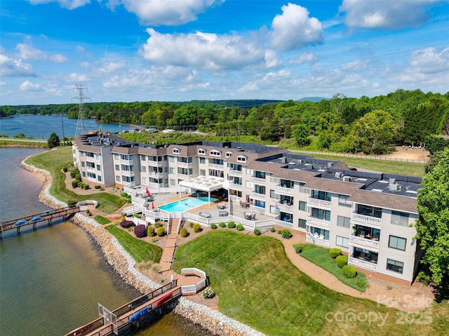 birds eye view of property featuring a water view
