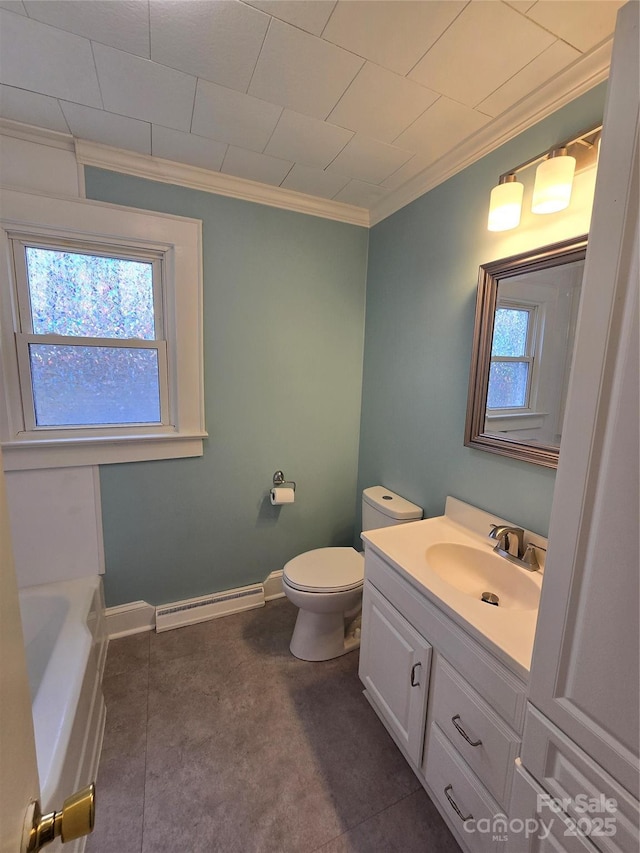 bathroom featuring a wealth of natural light, baseboard heating, toilet, and crown molding