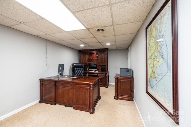 office with visible vents, light carpet, recessed lighting, baseboards, and a paneled ceiling