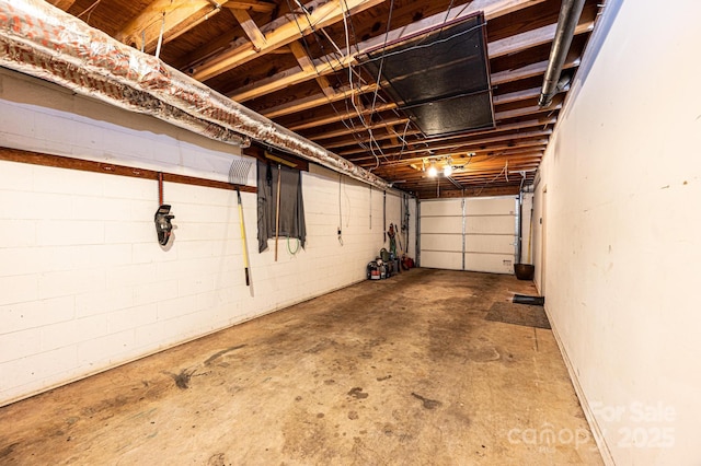 garage featuring concrete block wall