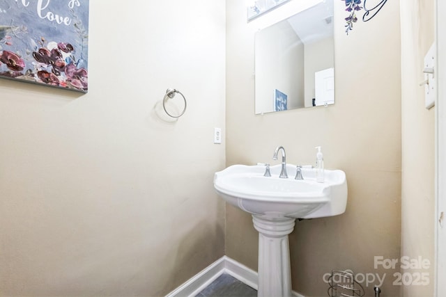 bathroom featuring baseboards