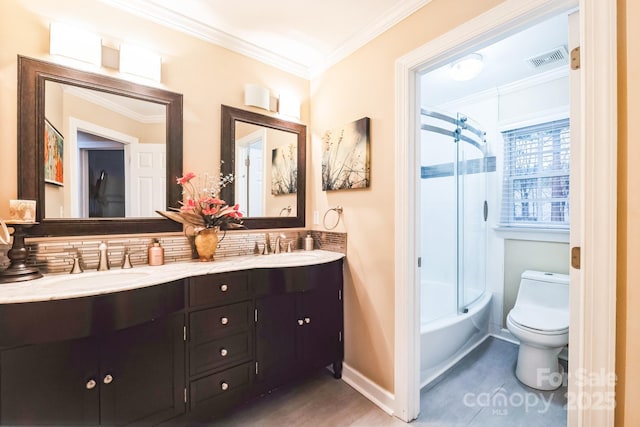 full bath featuring a sink, visible vents, toilet, and crown molding