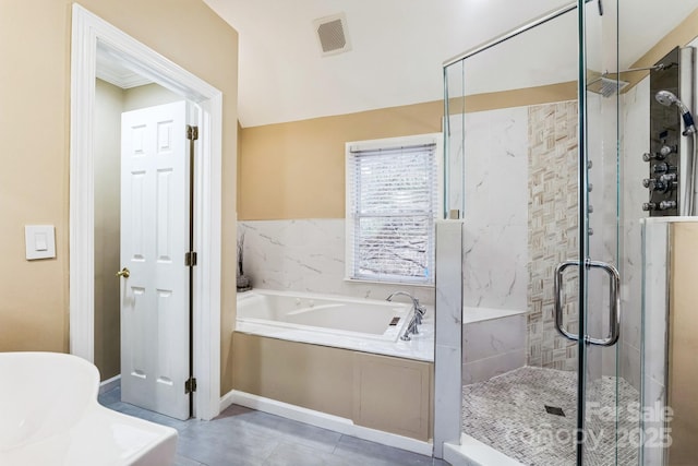 full bath with tile patterned flooring, visible vents, a shower stall, and a garden tub