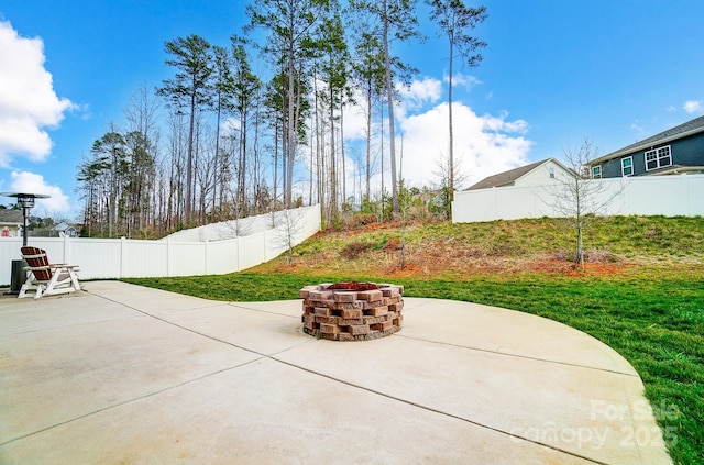 view of patio with a fire pit and a fenced backyard