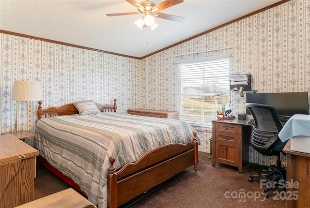 carpeted bedroom featuring a ceiling fan, wallpapered walls, ornamental molding, vaulted ceiling, and a textured ceiling