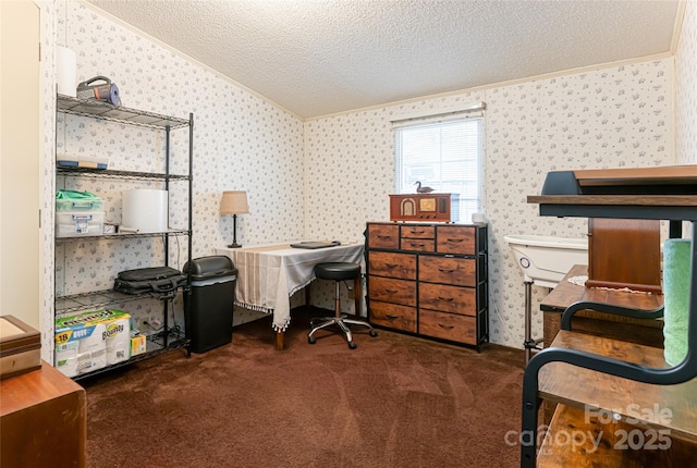 carpeted office with a textured ceiling, wallpapered walls, crown molding, and lofted ceiling