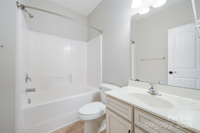 full bathroom featuring tile patterned floors, shower / bath combination, toilet, and vanity