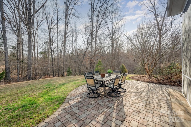 view of patio featuring outdoor dining area