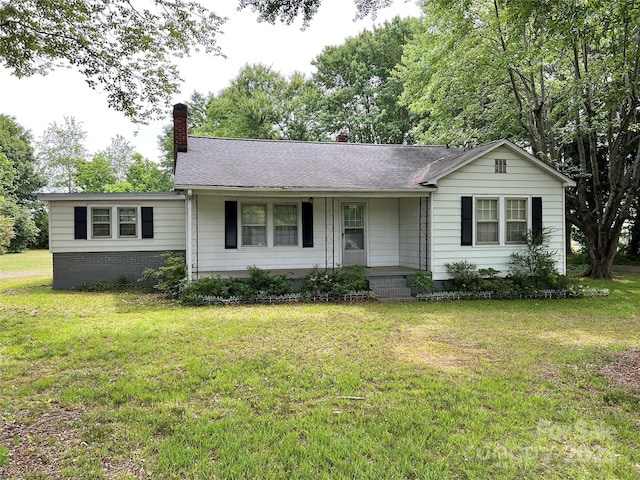 3672 NC Highway 127, Hickory, NC 28602 - single story home featuring a chimney, a porch, a front yard, and roof with shingles
